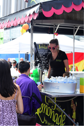 Crowd at lemonade stand Carnaval del Sol