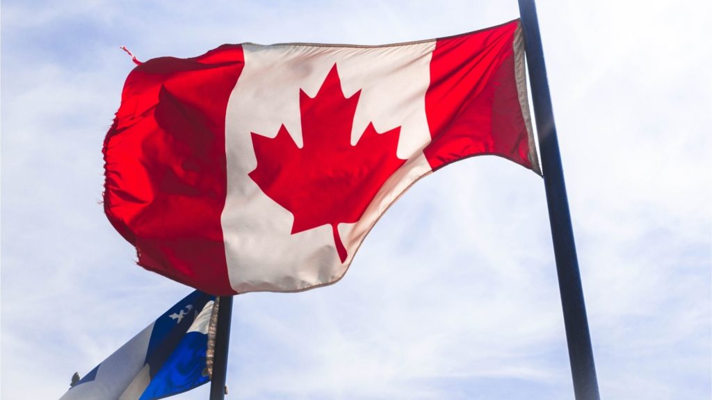 Canadian and Quebecois flags representing linguistic duality